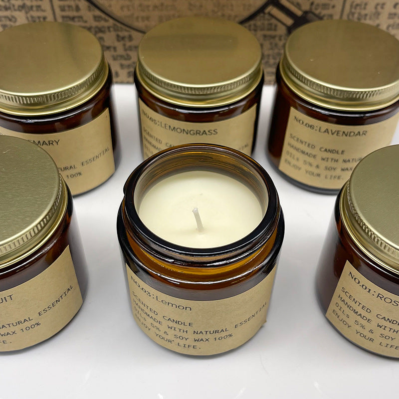 Amber glass soy wax candle collection with metal lids